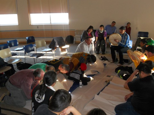 Dene hand games - hiding team on left