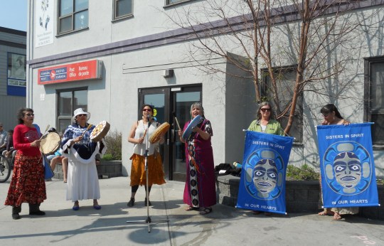 The lady drummers doing their thing